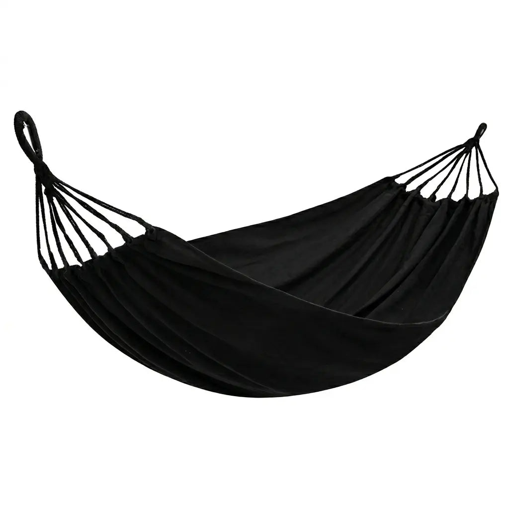 Hamac brésilien traditionnel en toile de coton noir intense sans barres d'écartement sur fond blanc.