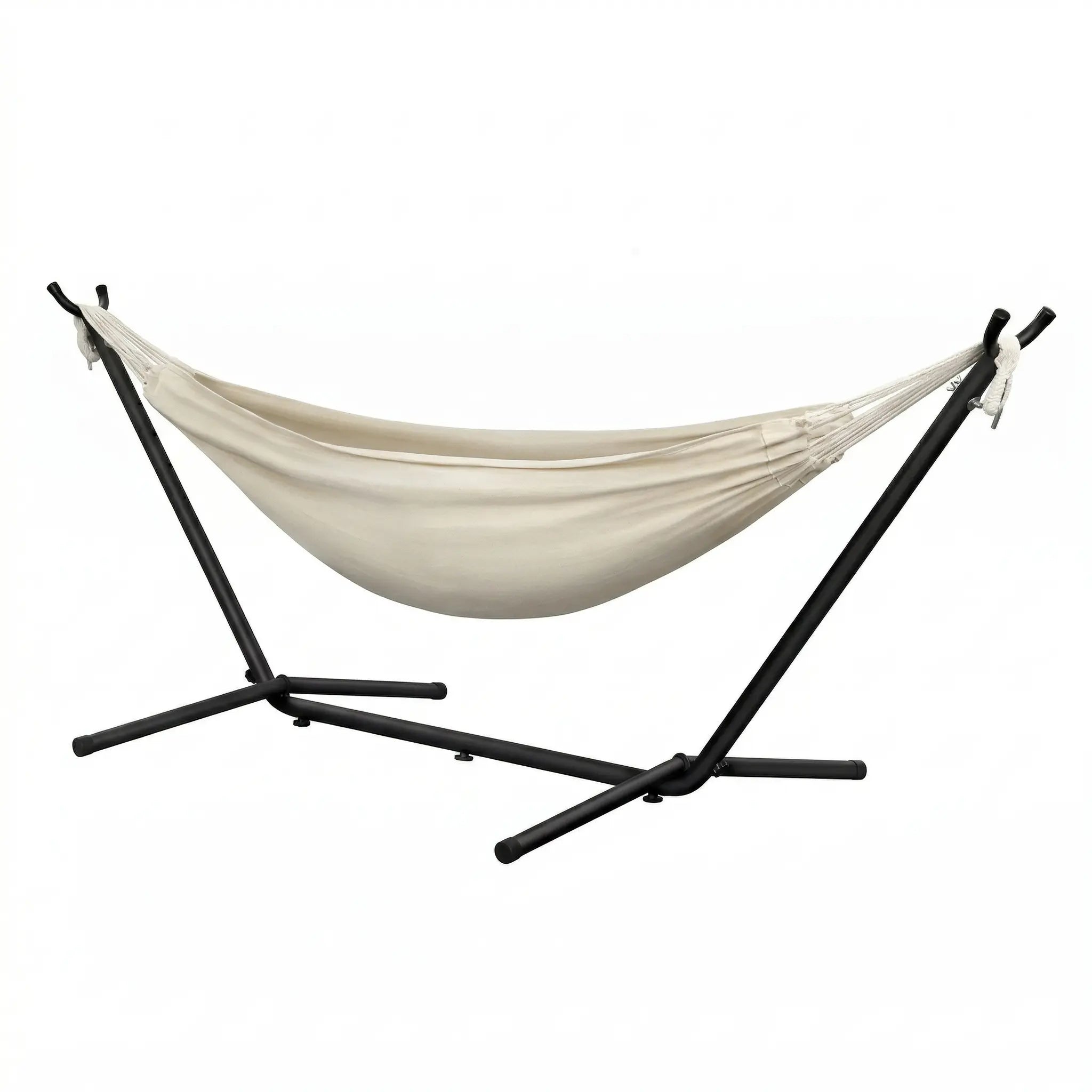 Hamac autoportant complet avec support métallique noir et toile en coton blanc crème uni de haute densité sur fond blanc épuré.